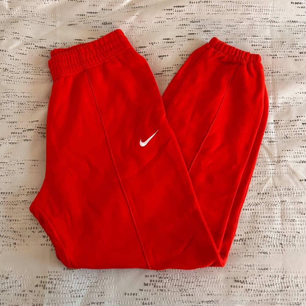 red Nike sweat pants